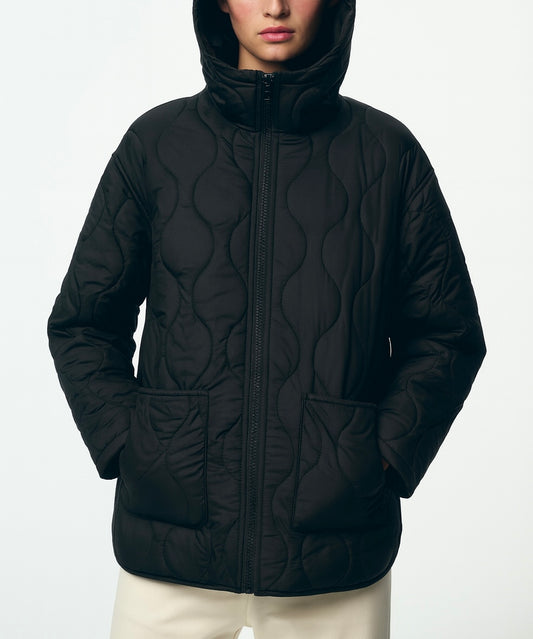 Cappotto lungo trapuntato • Donna 
