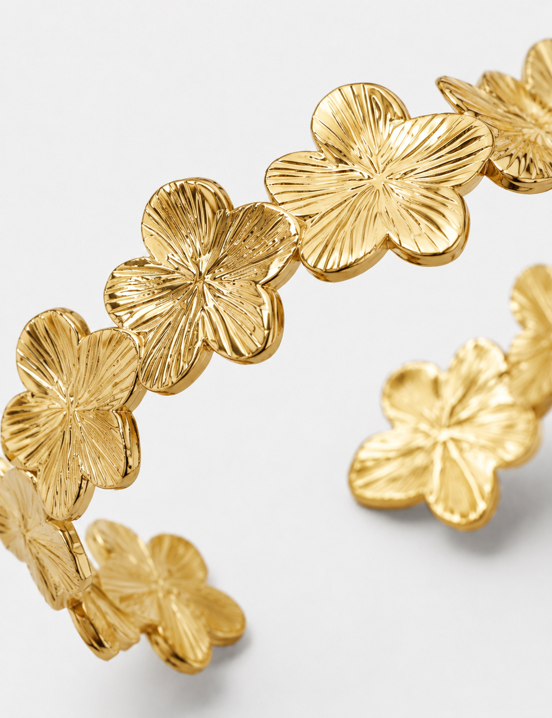 MANCHETTE OUVERTE MOTIF FLEURS