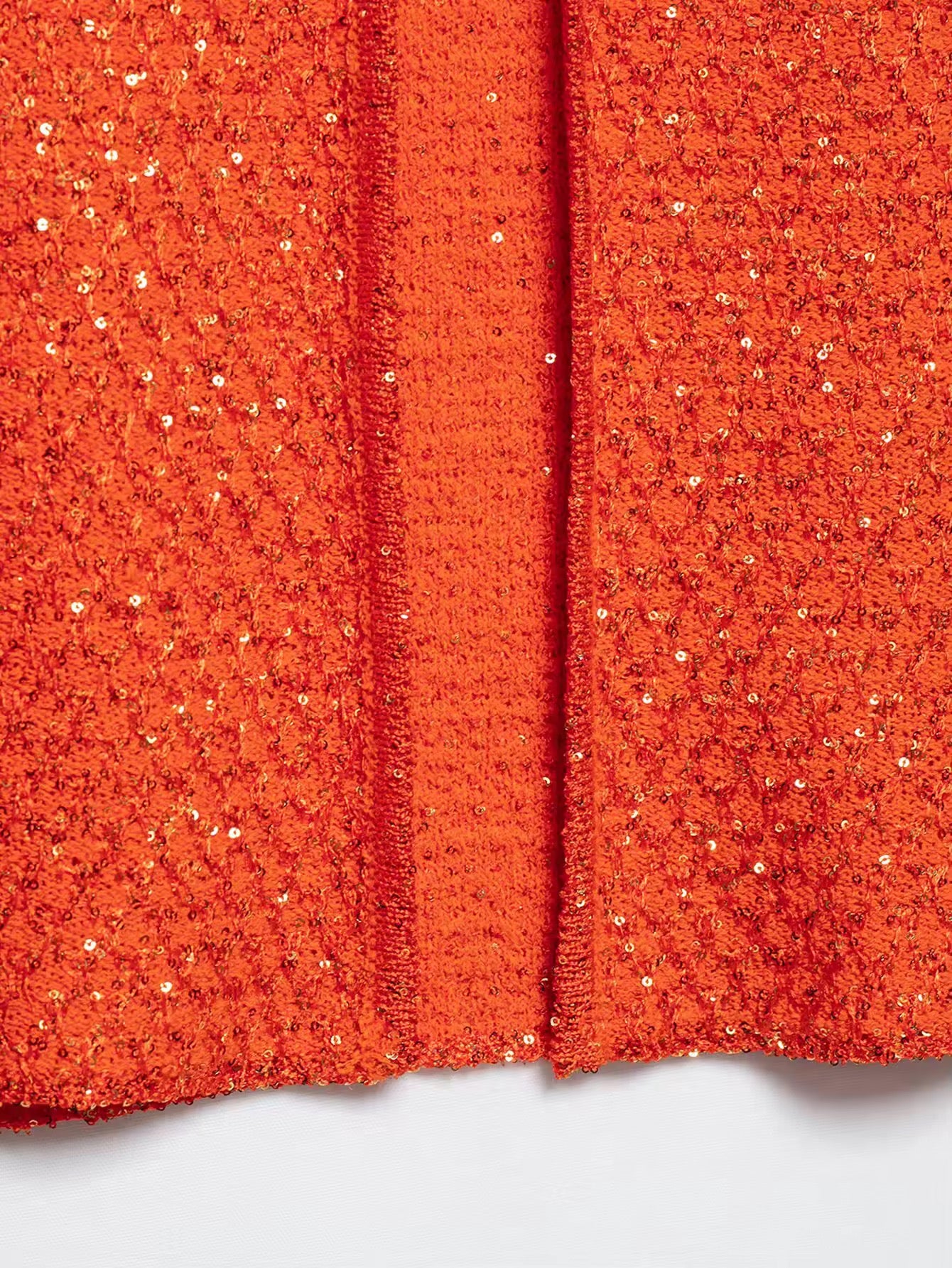 TOP EN MAILLE À SEQUINS