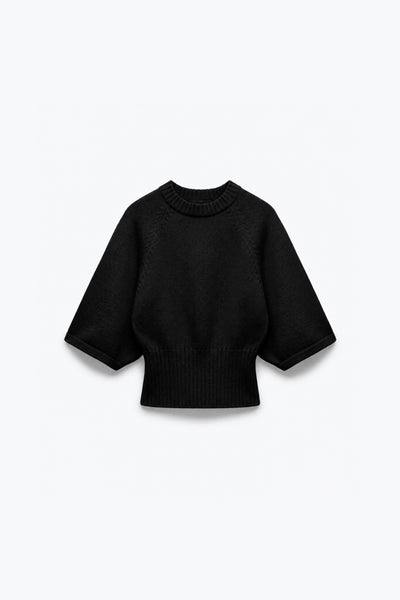 PULL EN MAILLE À TAILLE CINTRÉE