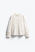 BLOUSE À EMPIÈCEMENT BRODÉ ET POIGNETS SMOCKÉS