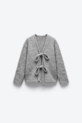 GILET EN MAILLE BOUCLÉE NOUÉ