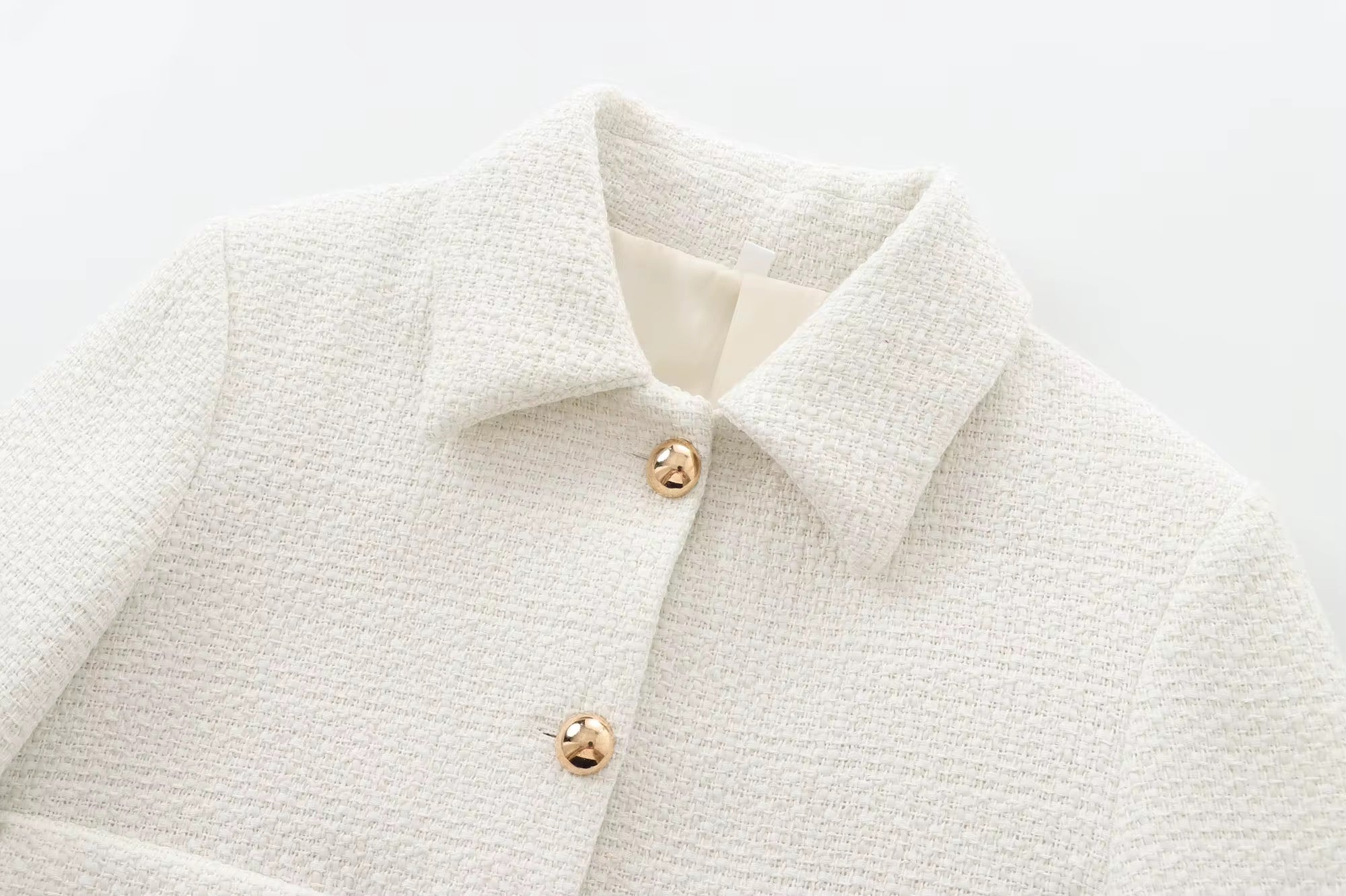 VESTE COURTE STRUCTURÉE À BOUTONS MÉTAL