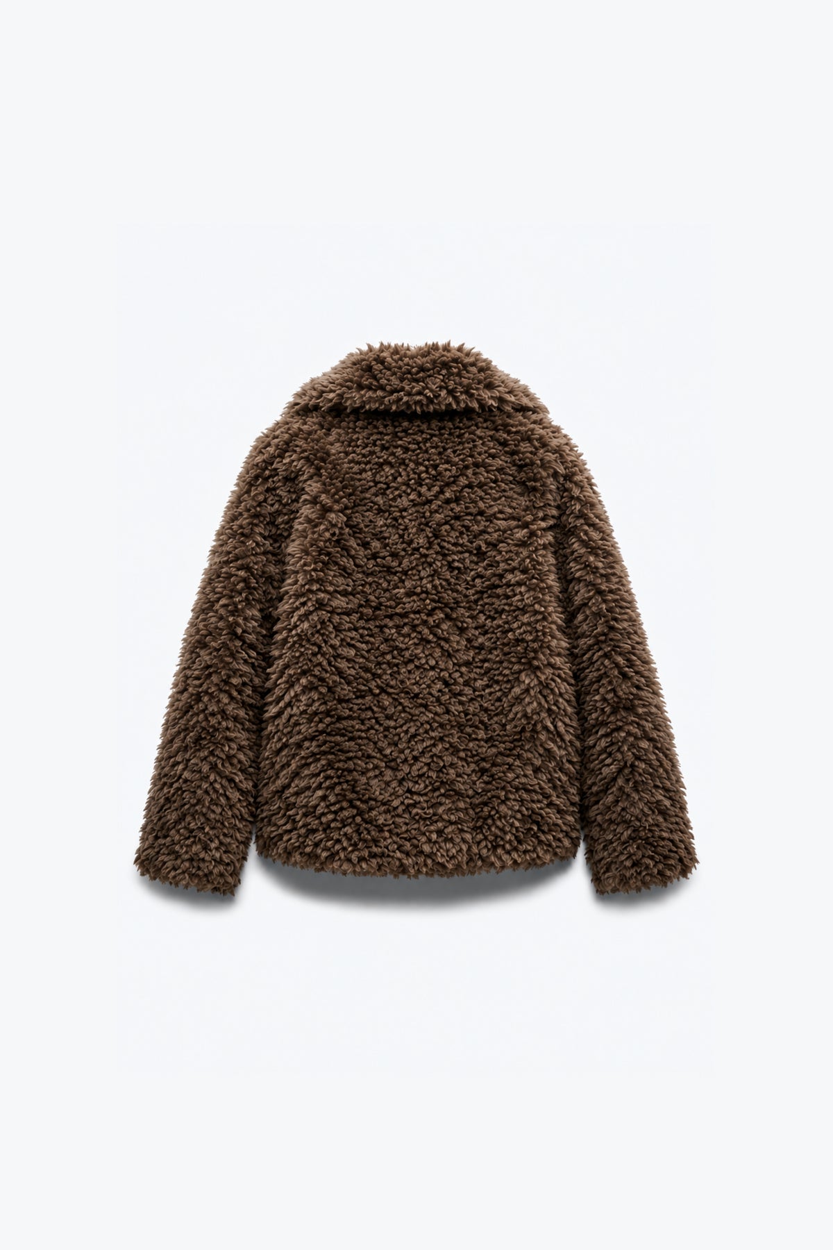 MANTEAU EFFET FOURRURE BOUCLÉE
