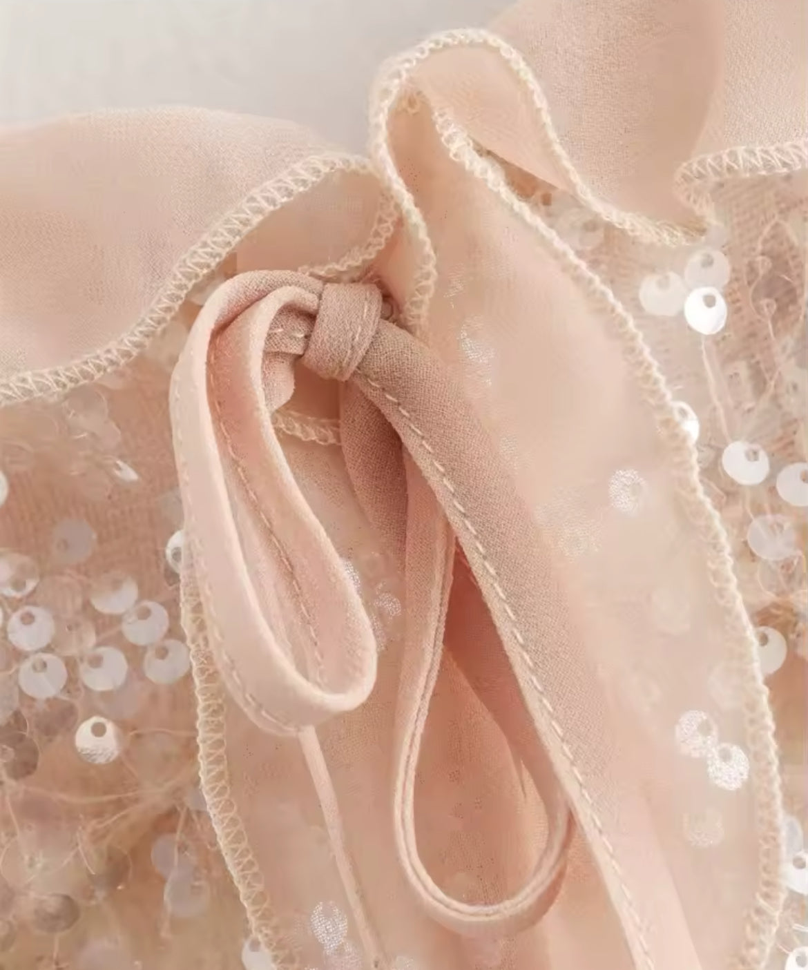 TOP À VOLANTS AVEC PAILLETTES