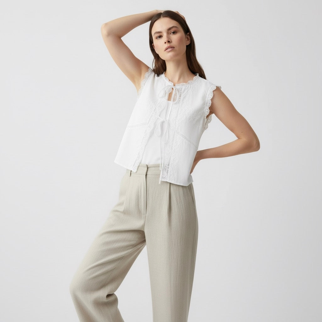 BLUSA CON LACCI RICAMATI