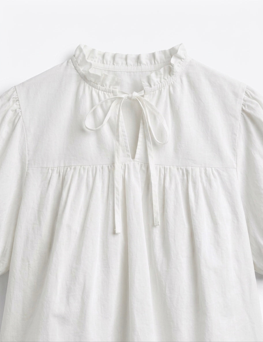 BLOUSE MANCHES BOUFFANTES COL NOUÉ