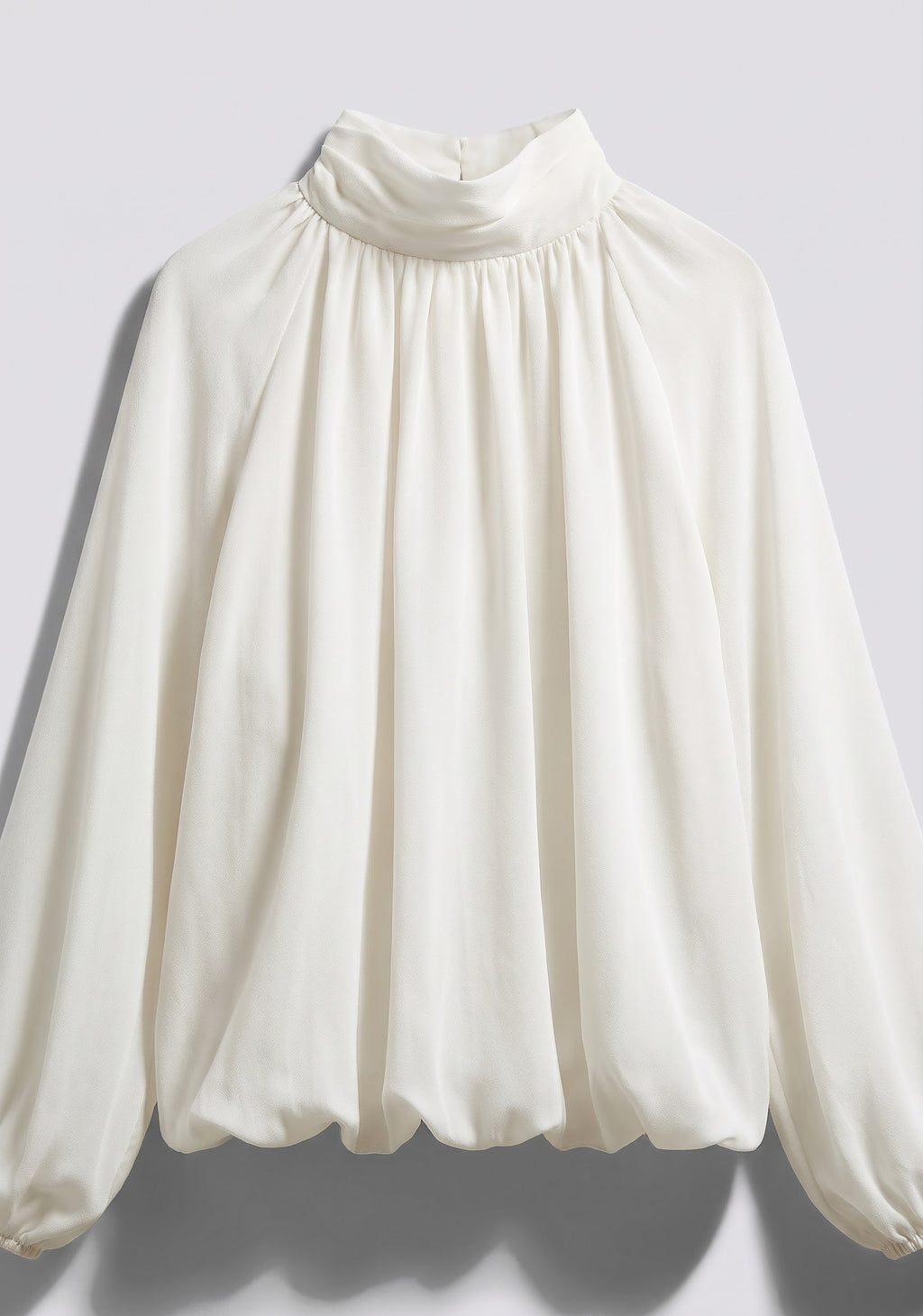 BLOUSE FLUIDE SATINÉE À OURLET BOULE