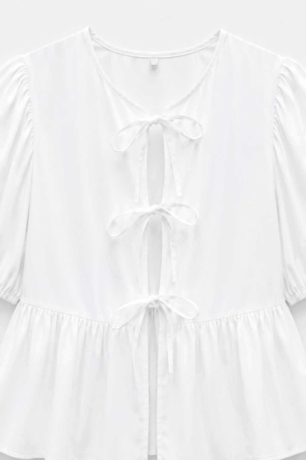 BLOUSE COURTE COL ROND MANCHES BOUFFANTES