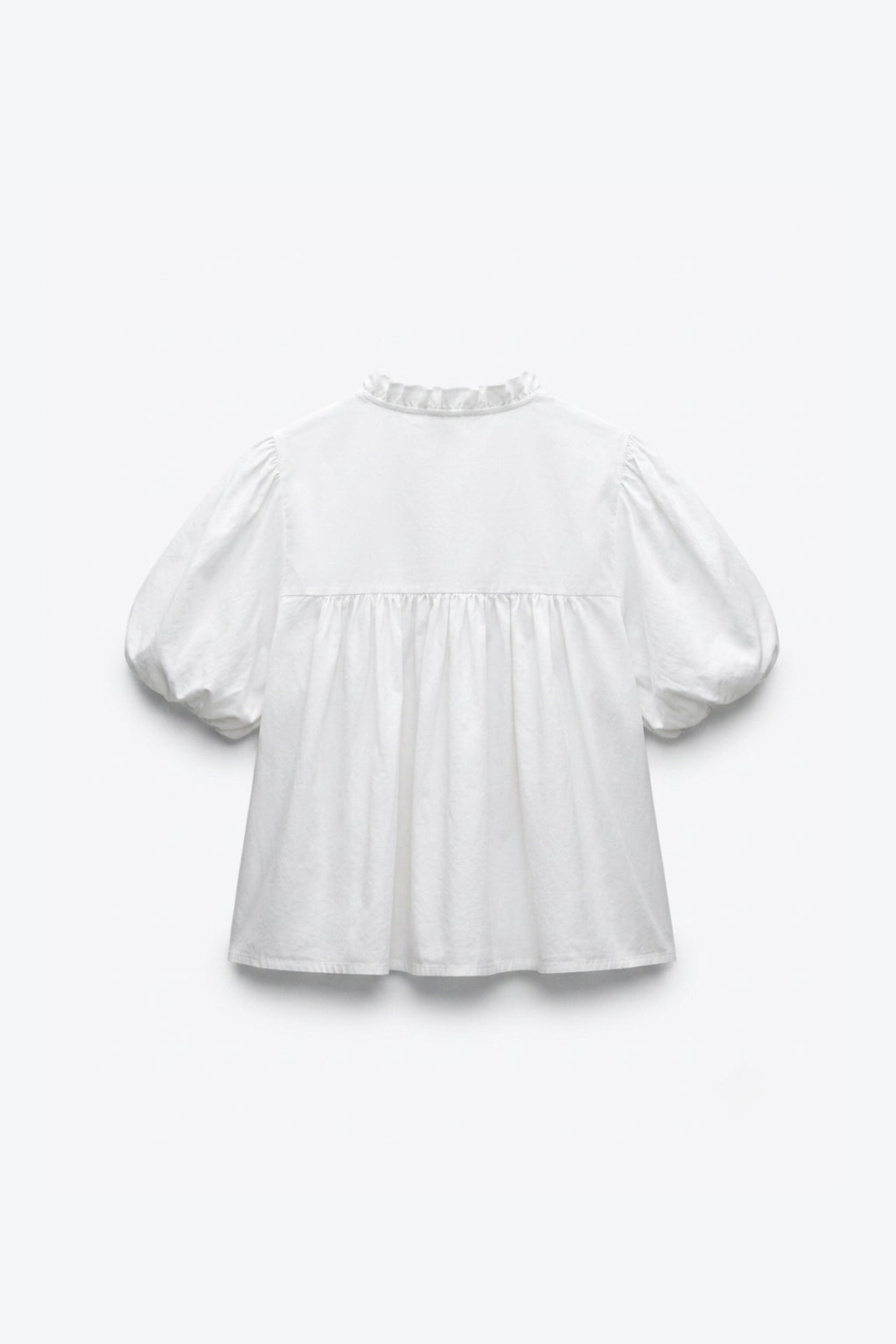 BLOUSE MANCHES BOUFFANTES COL NOUÉ