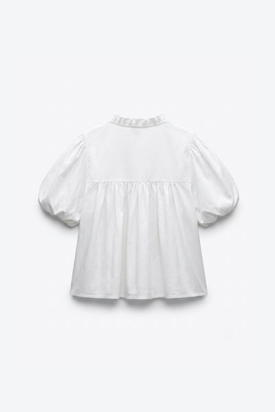 BLOUSE MANCHES BOUFFANTES COL NOUÉ