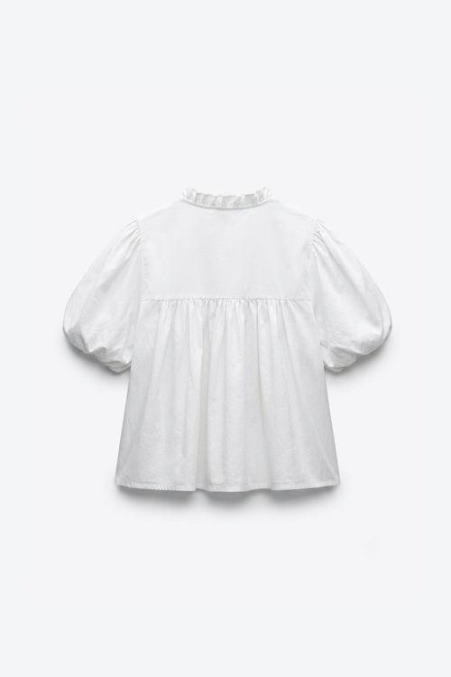 BLOUSE MANCHES BOUFFANTES COL NOUÉ