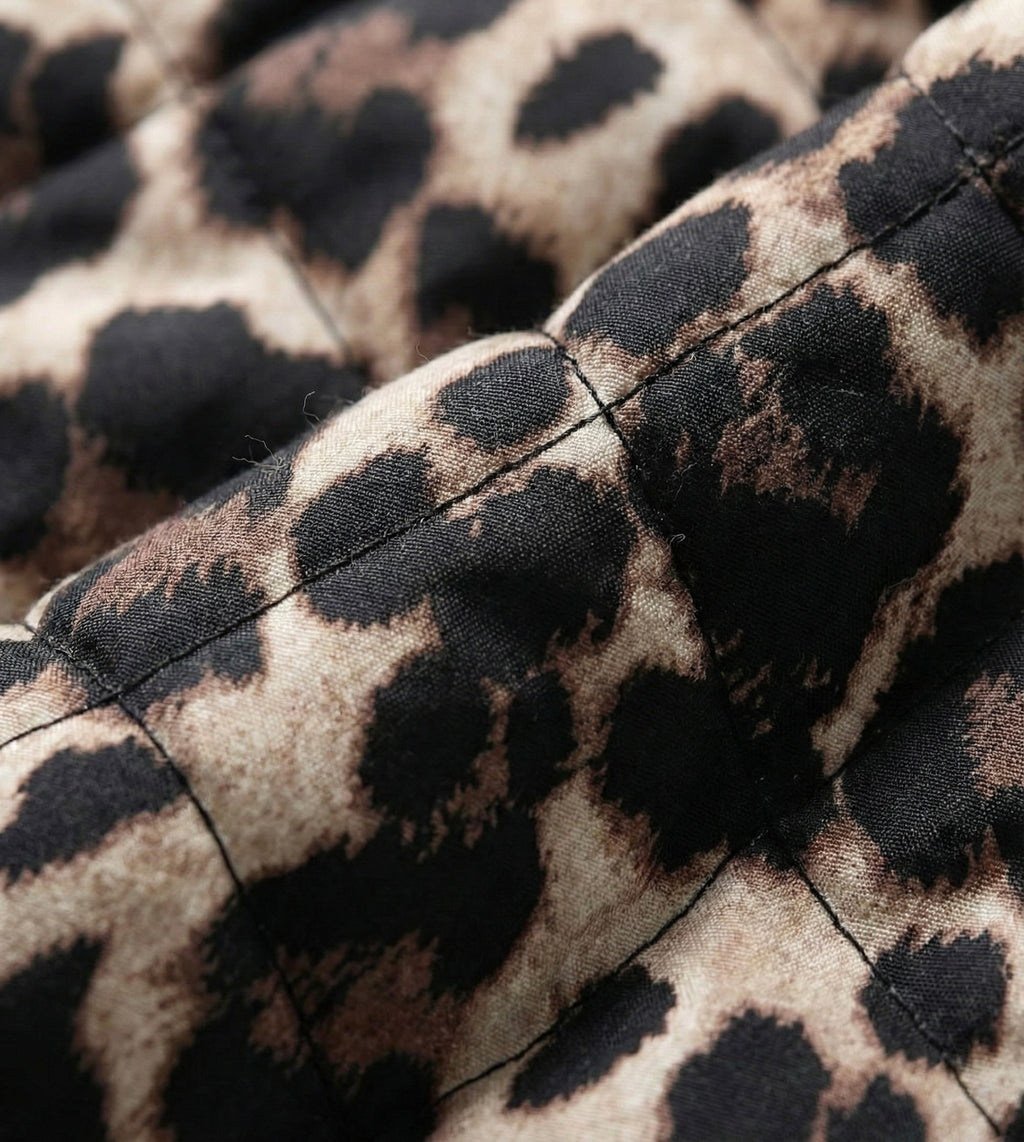 VESTE COURTE MOTIF LÉOPARD STRUCTURÉE