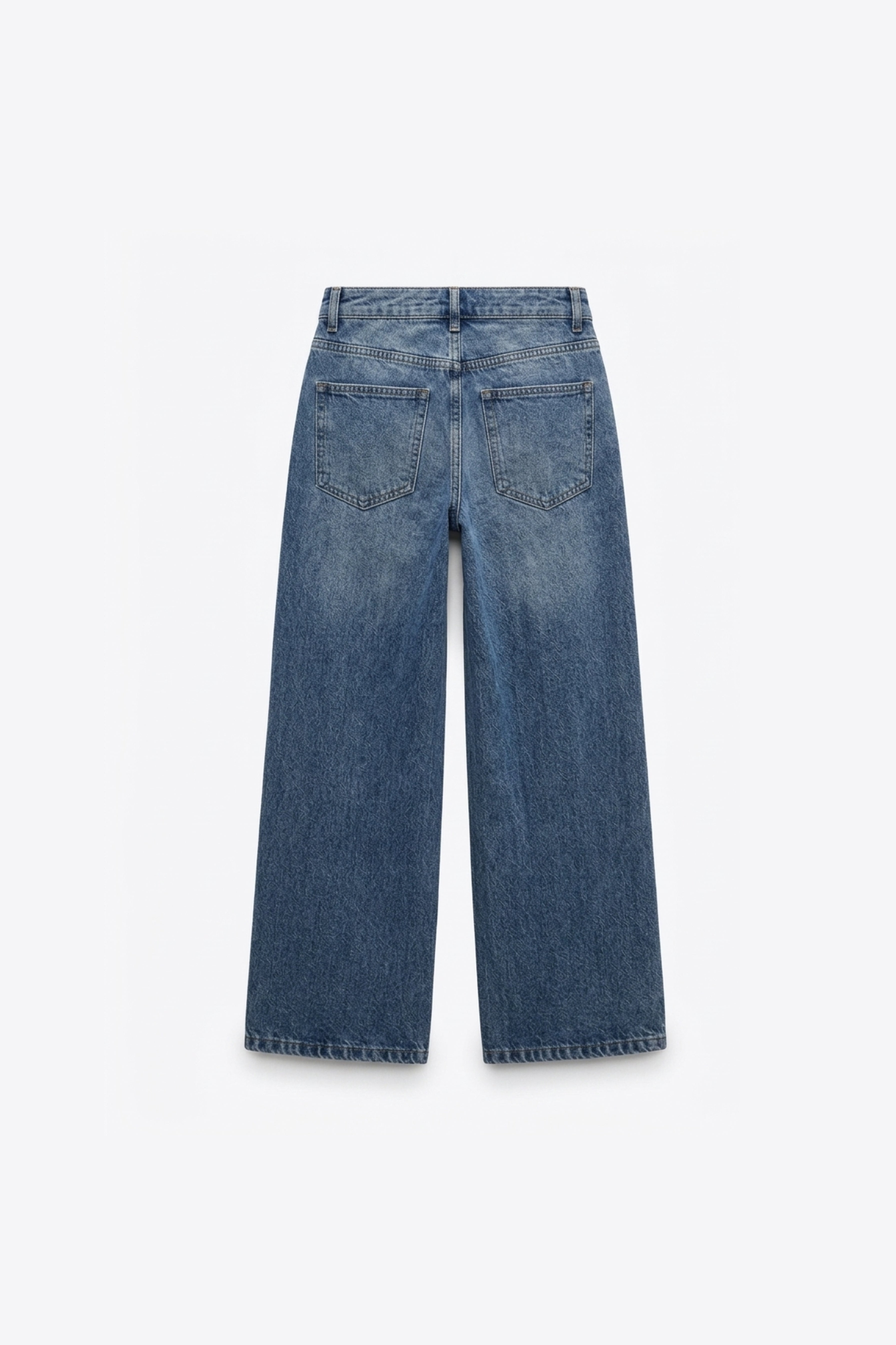 JEANS À FERMETURE ASYMÉTRIQUE