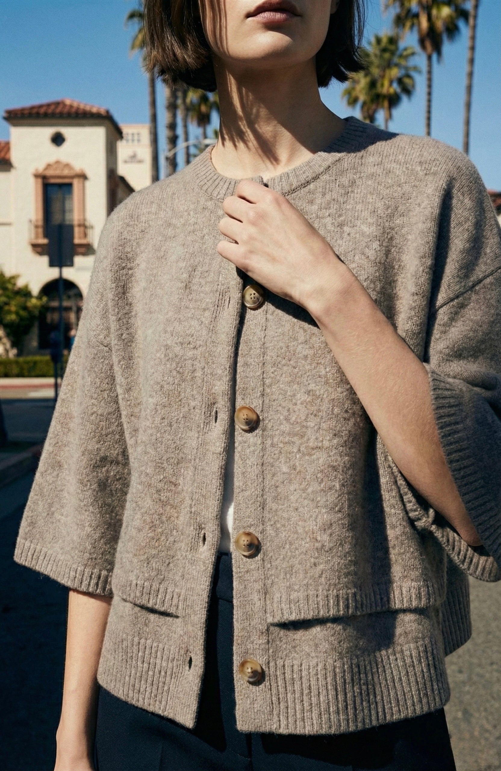 PONCHO CARDIGAN IN MAGLIA