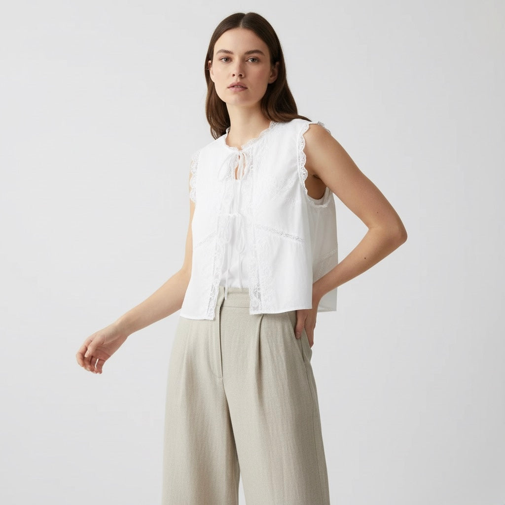 BLUSA CON LACCI RICAMATI