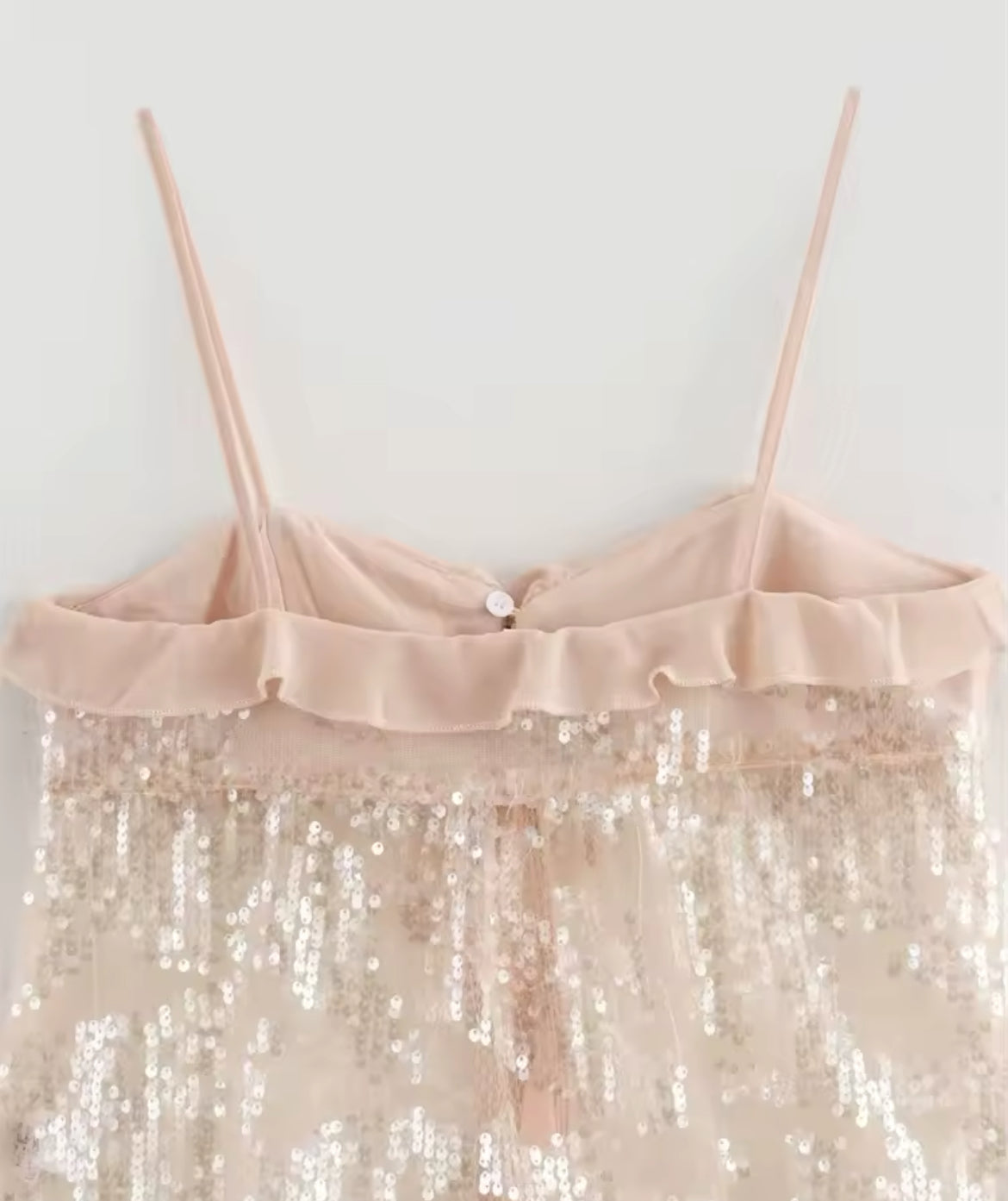 TOP À VOLANTS AVEC PAILLETTES