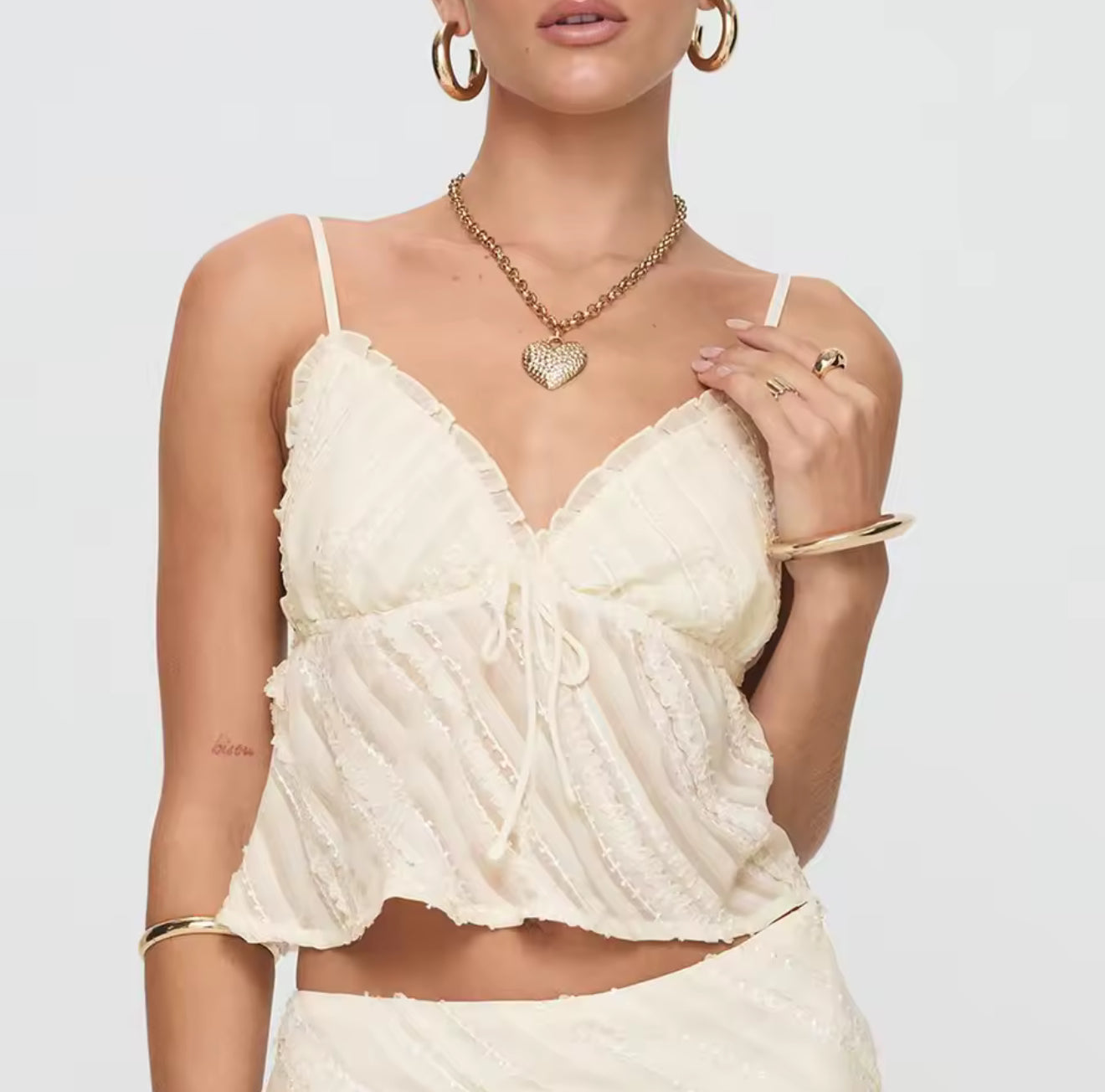 TOP À VOLANTS EN TULLE BRODÉ