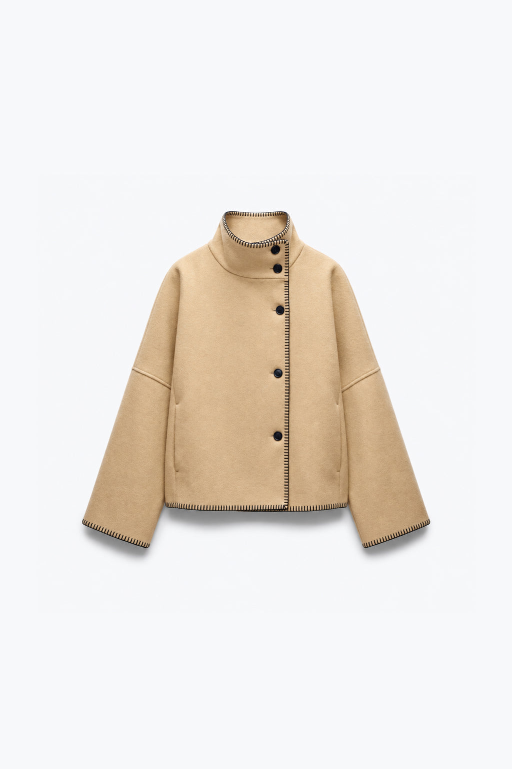 VESTE STRUCTURÉE À POINTS DE FESTON