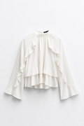 BLOUSE COURTE COL MONTANT VOLANTS
