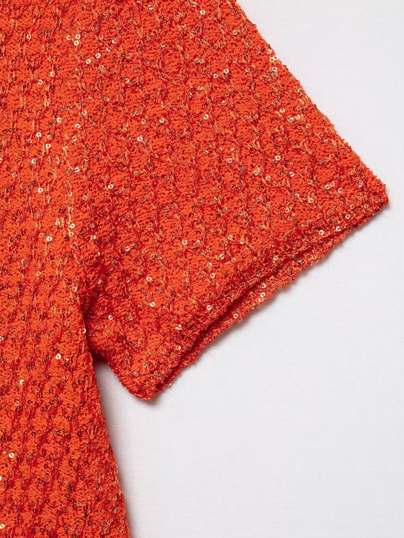TOP EN MAILLE À SEQUINS