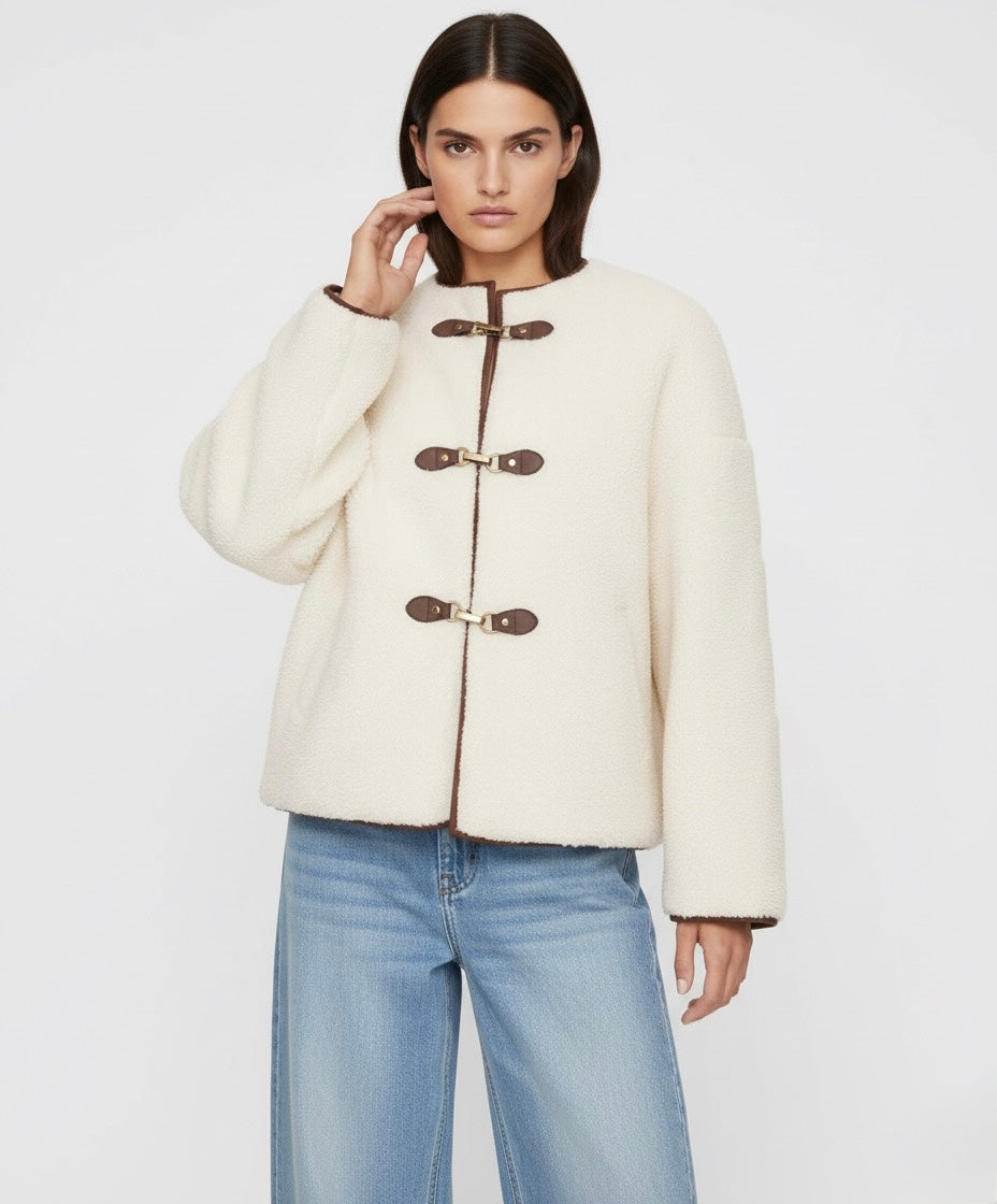 VESTE BOUCLÉE À FERMETURES MÉTALLIQUES