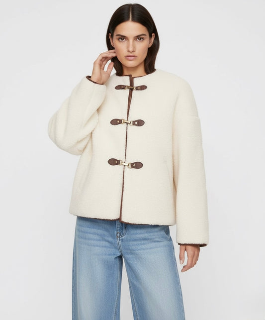 VESTE BOUCLÉE À FERMETURES MÉTALLIQUES