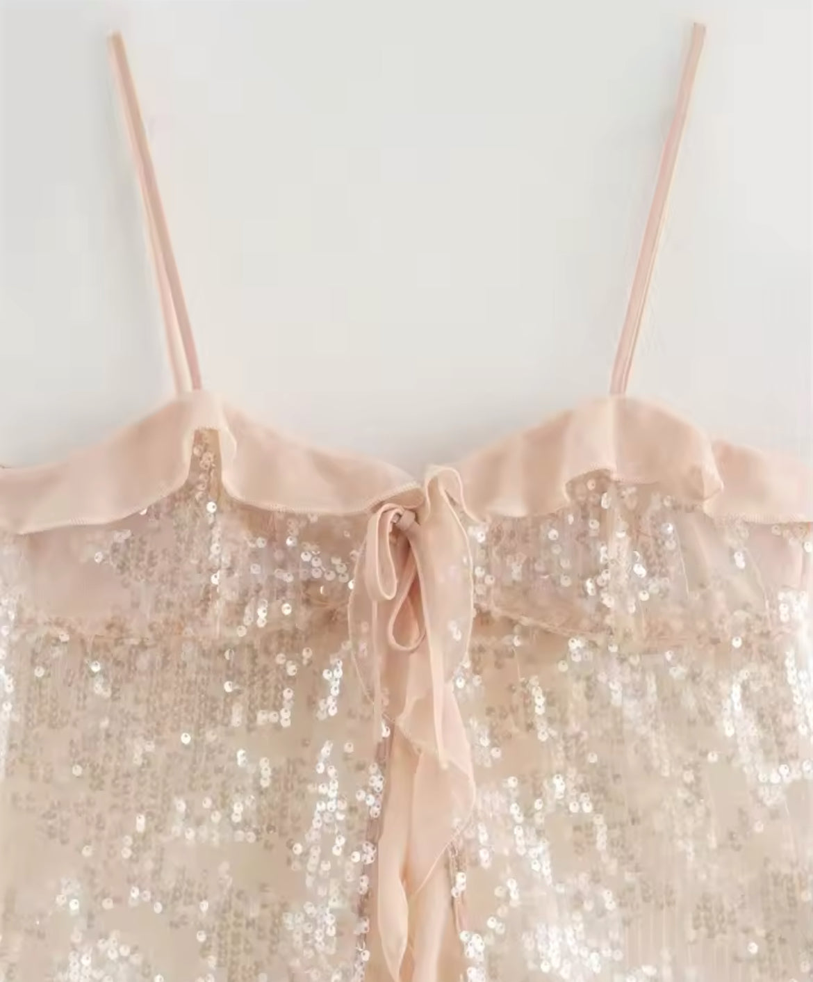 TOP À VOLANTS AVEC PAILLETTES