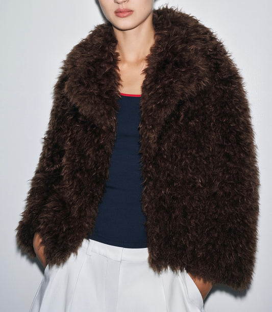 VESTE EFFET FOURRURE BOUCLÉE