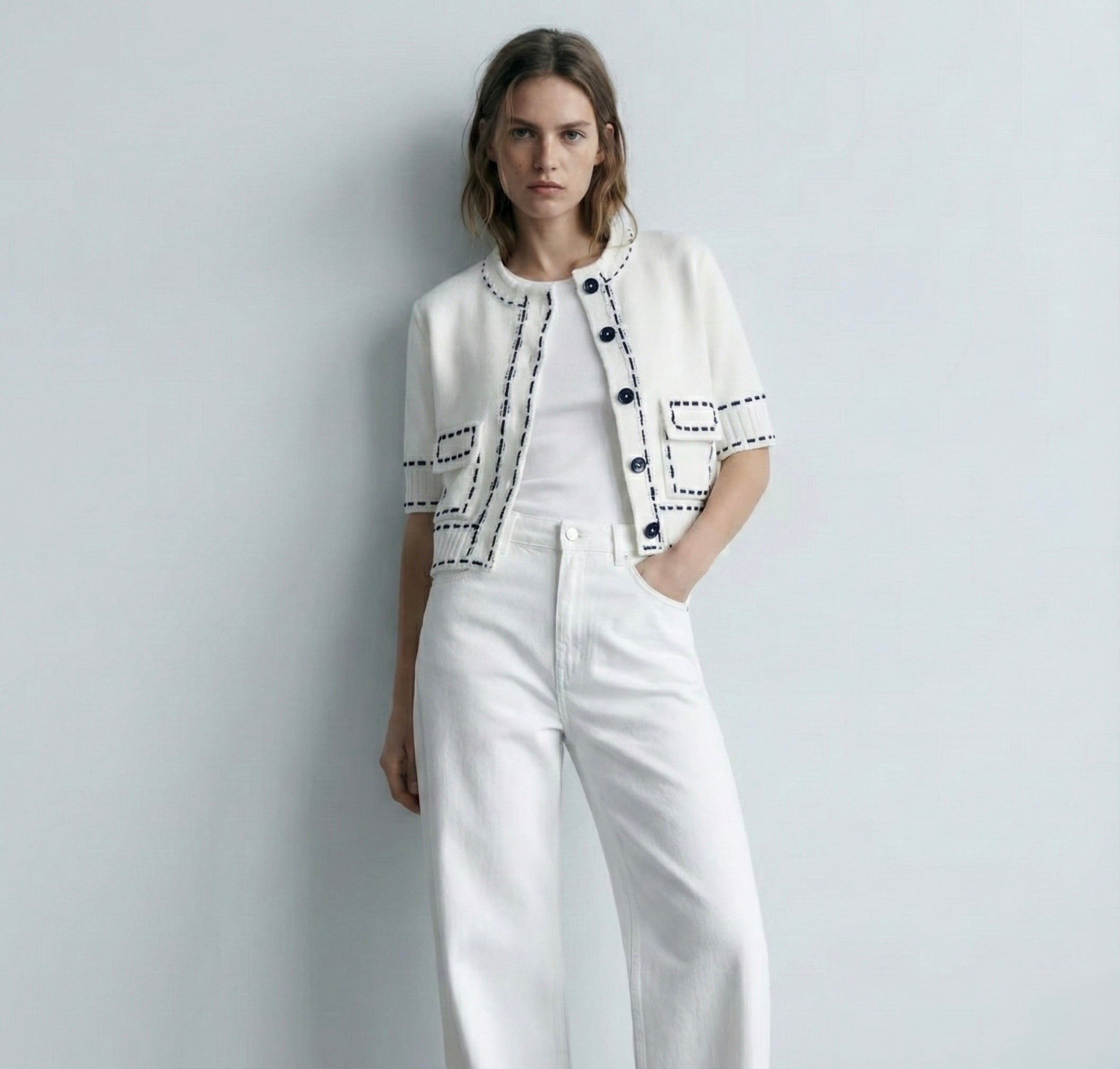 GILET COURT À BOUTONS FACETÉS