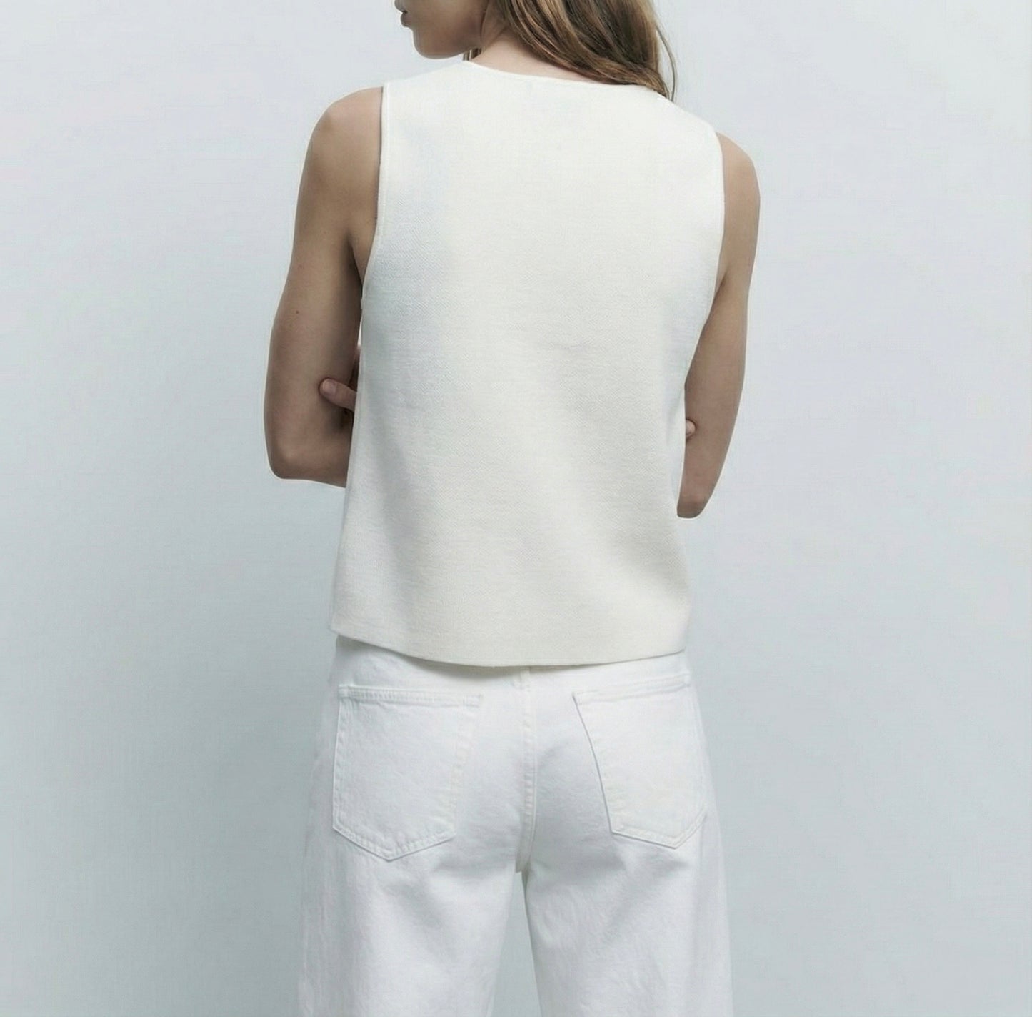 GILET IN MAGLIA CON BOTTONI