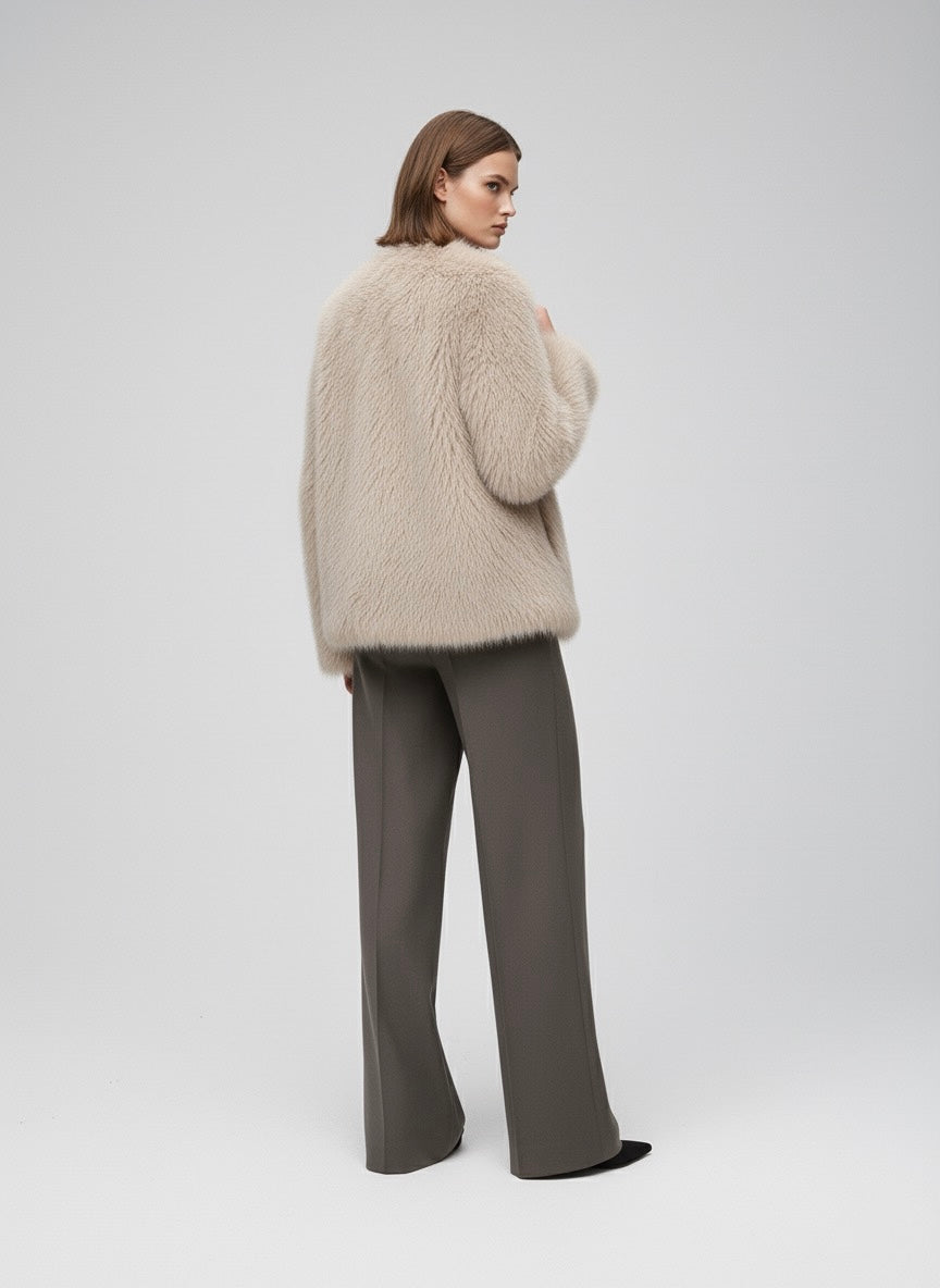 MANTEAU EFFET FOURRURE COUPE DROITE