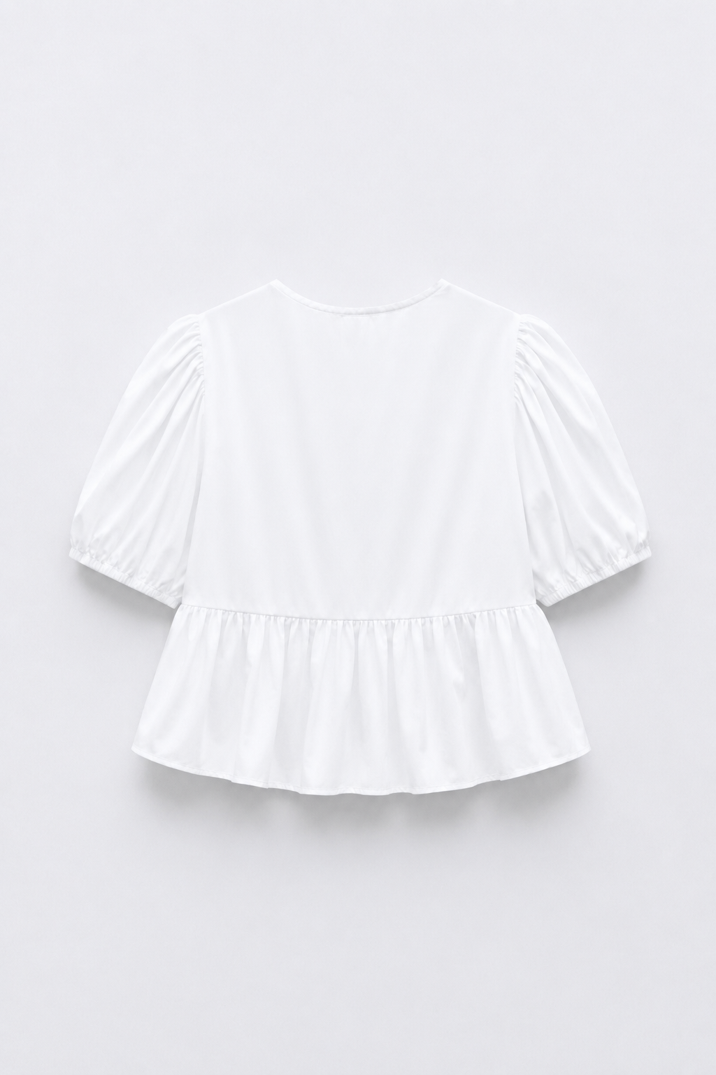 BLOUSE COURTE COL ROND MANCHES BOUFFANTES