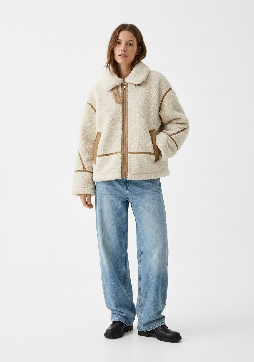 VESTE EFFET LAINE AVEC DÉTAILS CONTRASTÉS