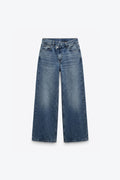 JEANS À FERMETURE ASYMÉTRIQUE