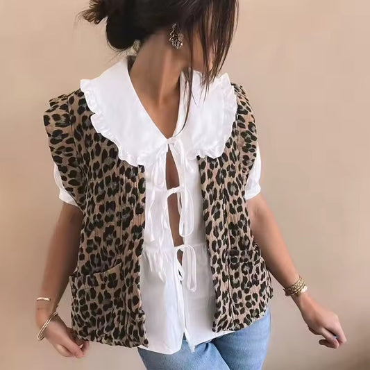 VESTE SANS MANCHES IMPRIMÉE LÉOPARD