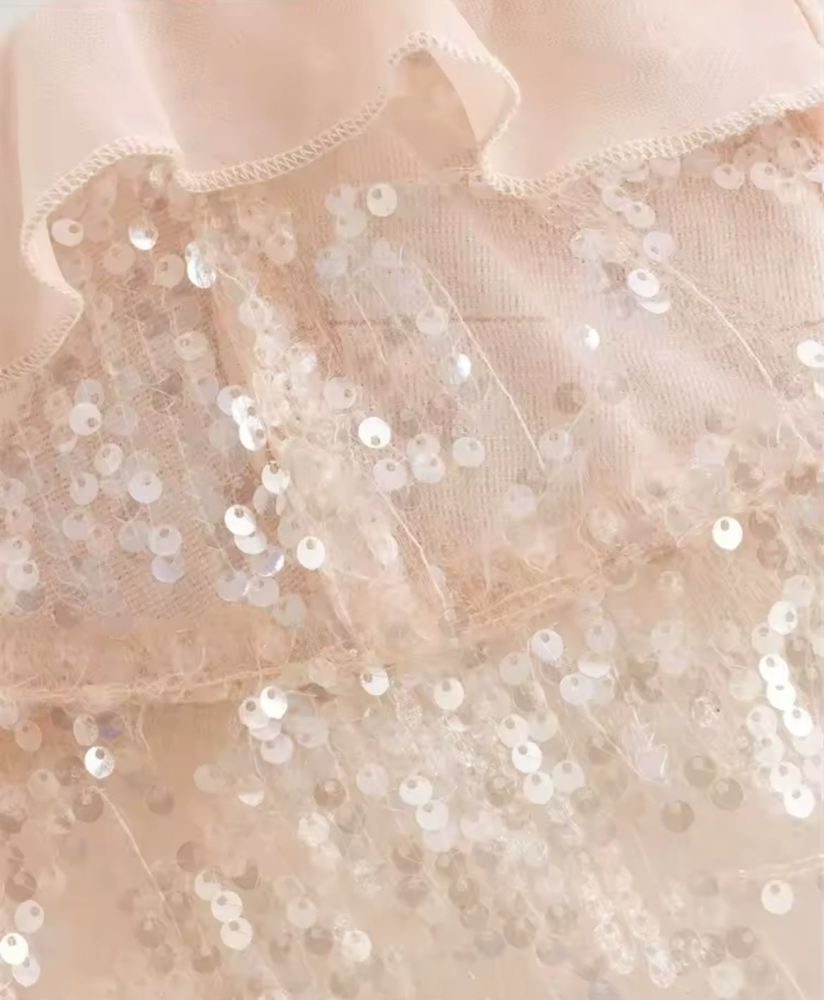 TOP À VOLANTS AVEC PAILLETTES