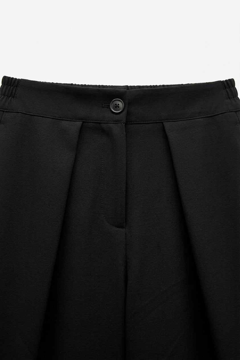 PANTALON LARGE À PLIS