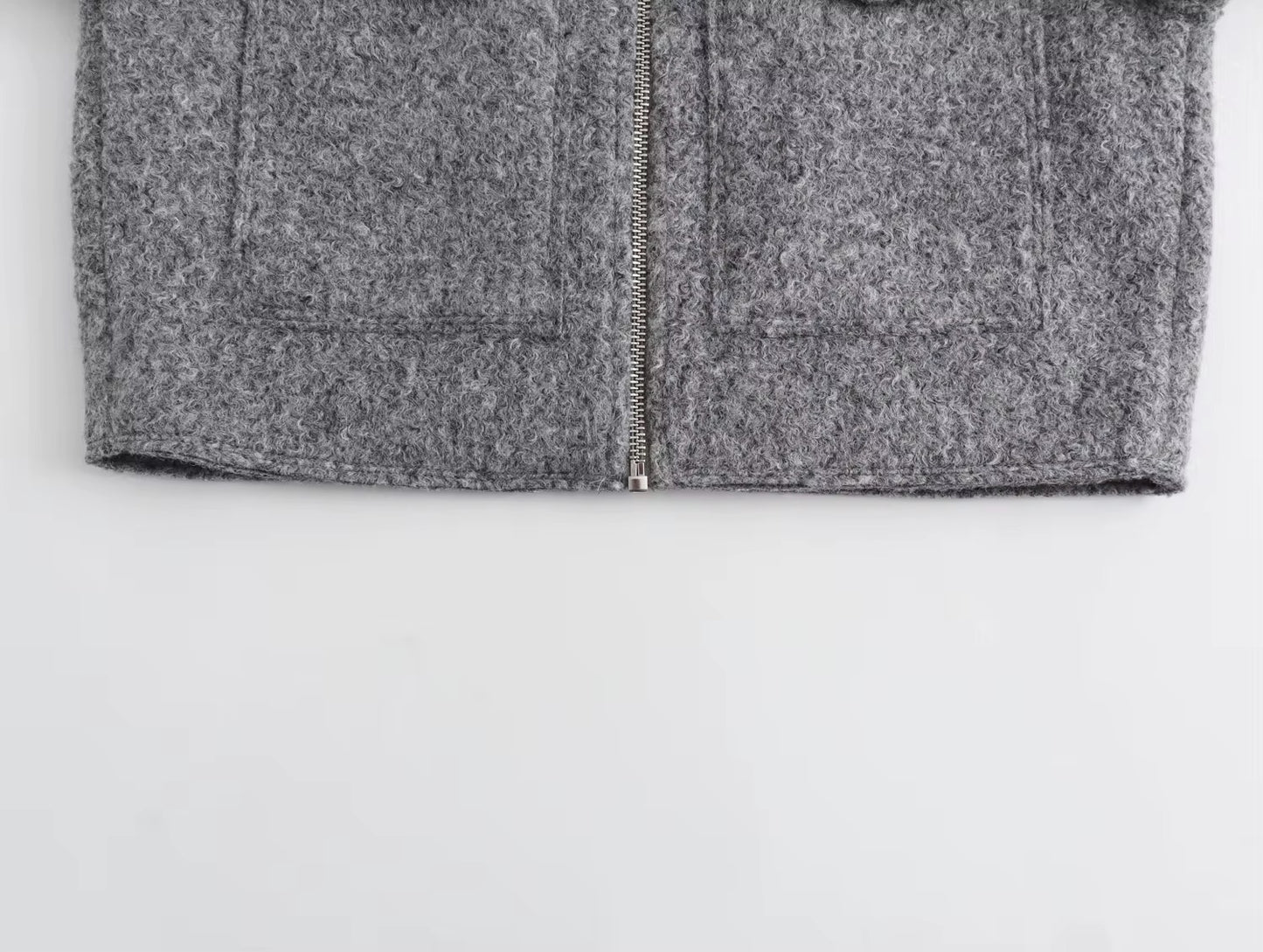 VESTE COURTE EN MAILLE
