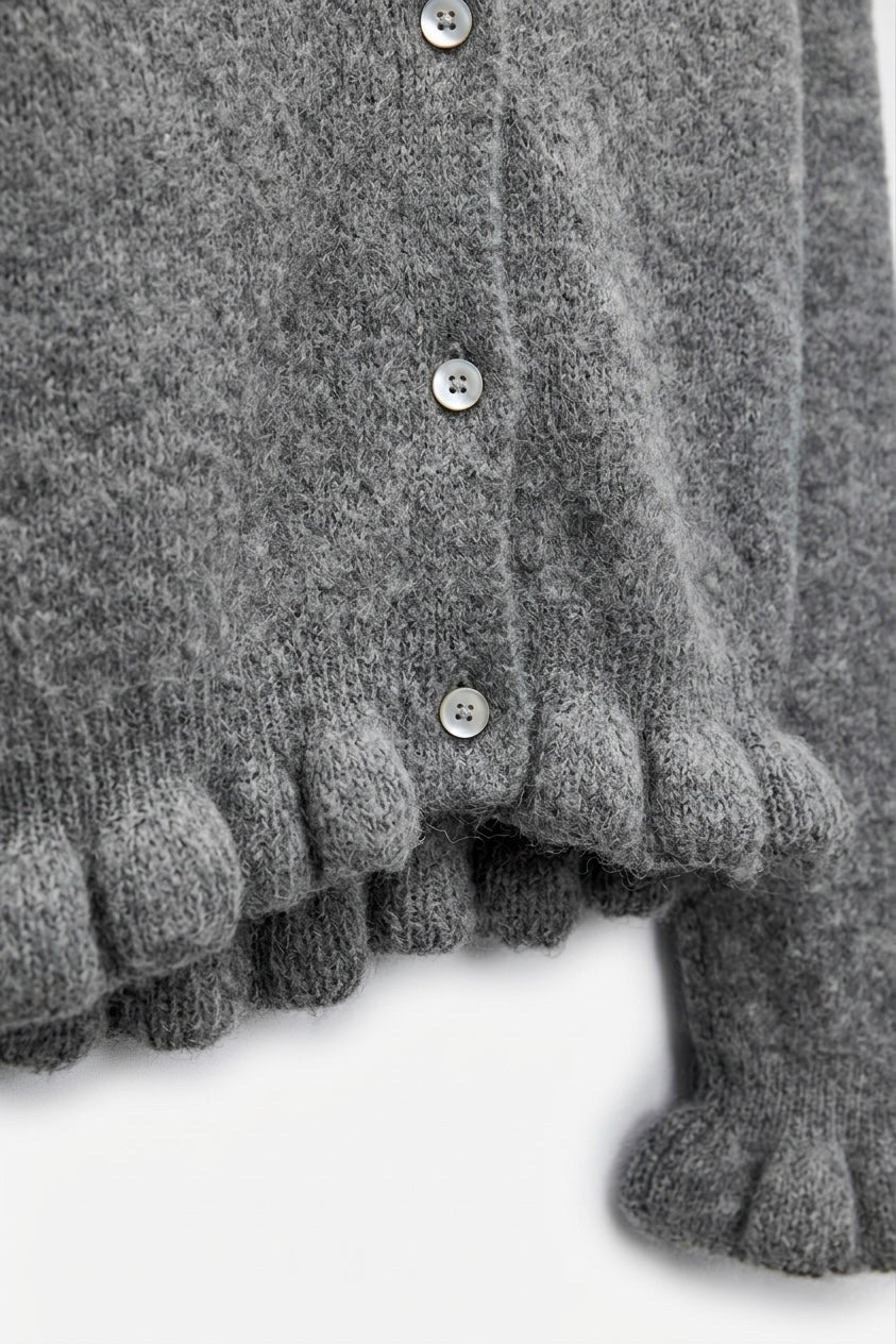 CARDIGAN À VOLANTS ET BOUTONS NACRÉS