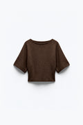 PULL COURT EN MAILLE CINTRÉ
