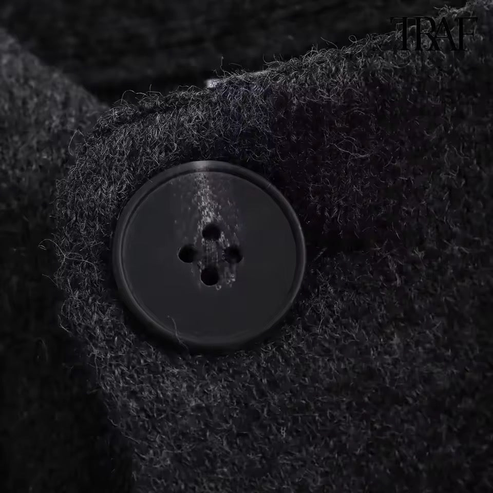 MANTEAU STRUCTURÉ À DRAPÉ INTÉGRÉ