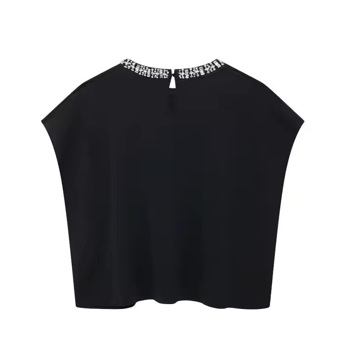 Pull over sans manche col en perles