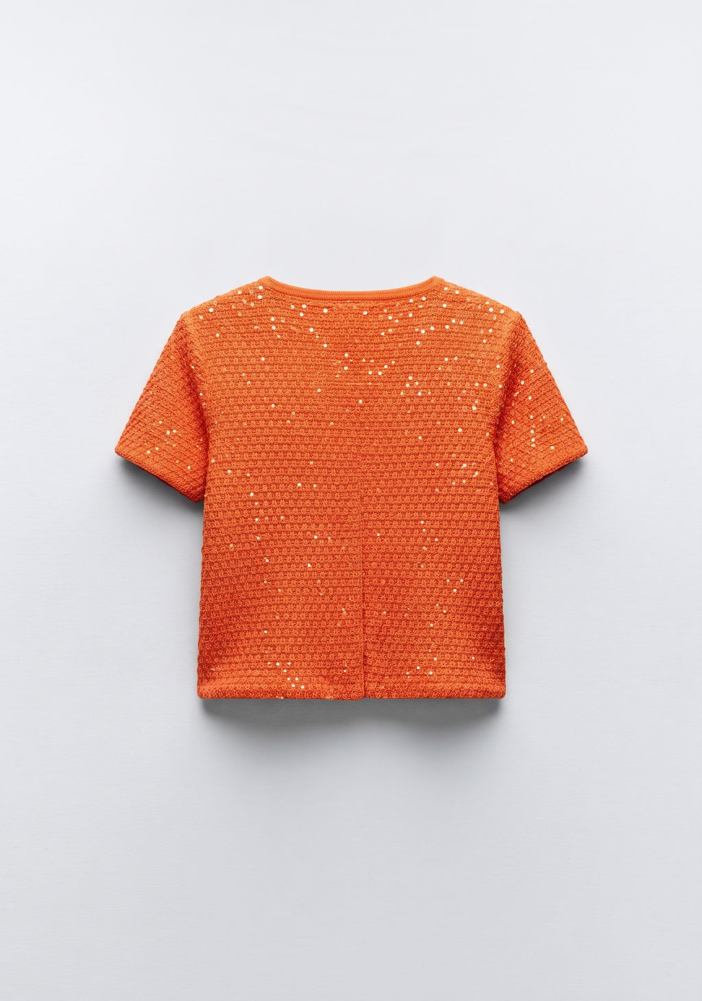 GILET EN TRICOT TEXTURÉ À MANCHES COURTES