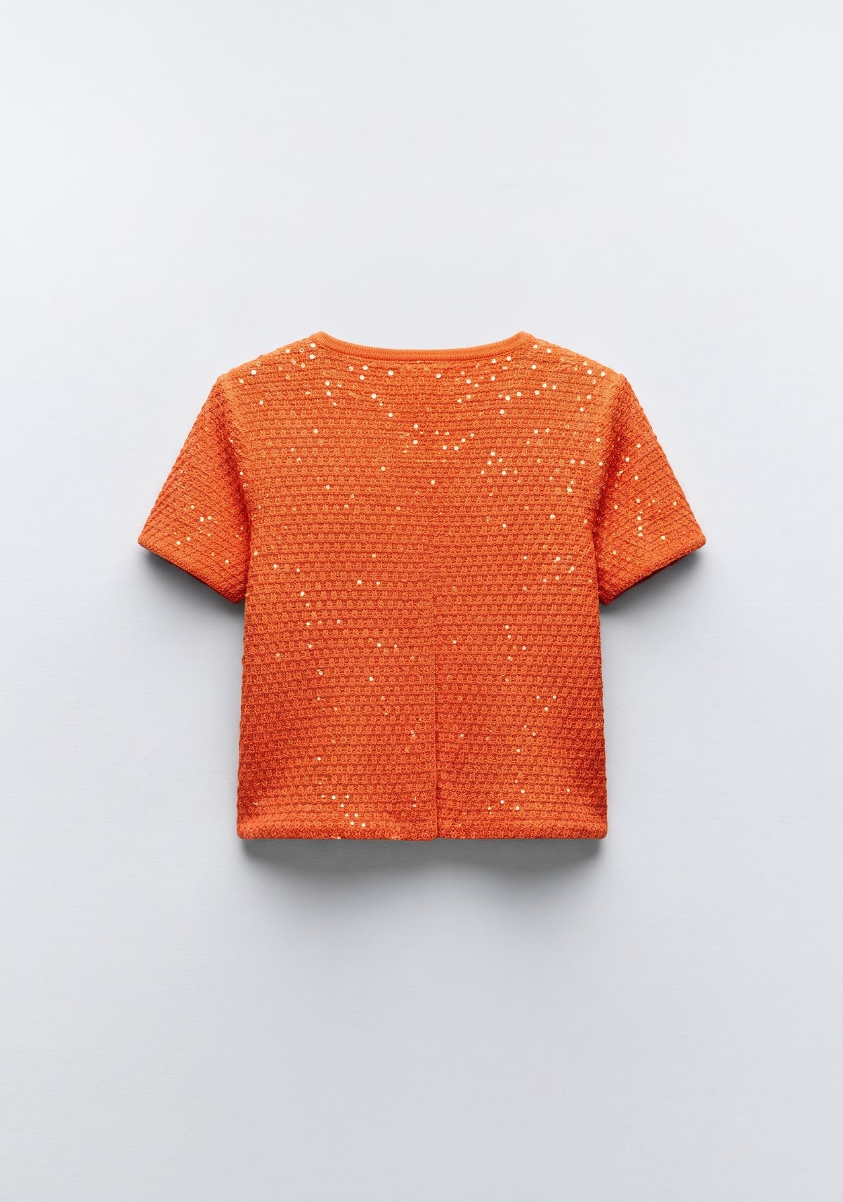 GILET EN TRICOT TEXTURÉ À MANCHES COURTES