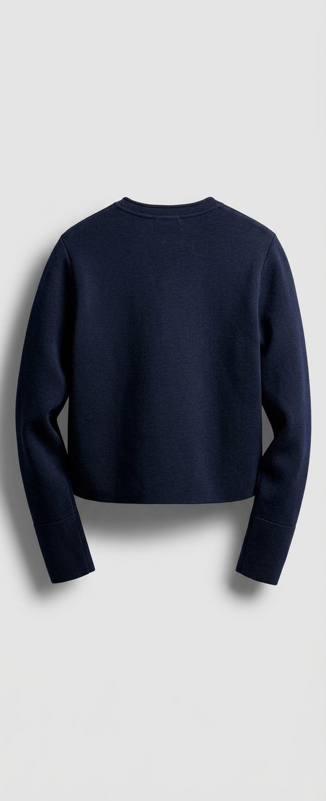 VESTE EN MAILLE À BOUTONS DORÉS